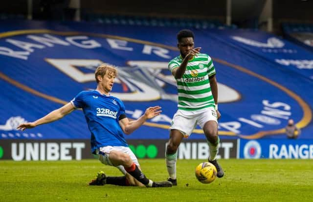 Rangers defender Filip Helander slides in to halt Celtic striker Odsonne Edouard during the Scottish Cup tie at Ibrox. (Photo by Craig Williamson / SNS Group)