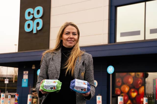 Rachael Duncan, owner of Duncan Farms, outside a Co-op branch.