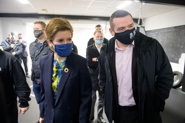 Nicola Sturgeon and Scottish Conservative leader Douglas Ross visit the Bluevale Community Club in Glasgow