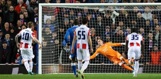 GLASGOW, SCOTLAND - MARCH 10: Rangers' goalkeeper Allan McGregor saves a penalty Red Star's Aleksandar Katai during a UEFA Europa League match between Rangers and Red Star Belgrade at Ibrox Stadium, on March 10, 2022, in Glasgow, Scotland. (Photo by Alan Harvey / SNS Group)