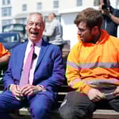 Reform UK leader Nigel Farage (centre) with supporters during a visit to Ramsgate in Kent. Picture: Gareth Fuller/PA Wire