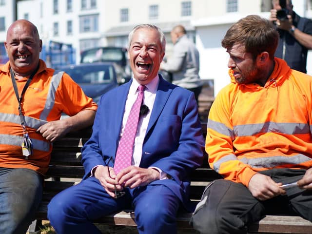 Reform UK leader Nigel Farage (centre) with supporters during a visit to Ramsgate in Kent. Picture: Gareth Fuller/PA Wire