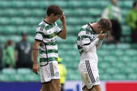 A dejected Callum McGregor and Matt O'Riley at full-time on Saturday after the scoreless draw left their team without a goal in two straight domestic matches. Extending that run to three at Ibrox on Sunday would recall the dark days of the 1990s. (Photo by Craig Foy / SNS Group)