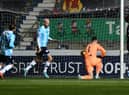Zak Rudden opens the scoring for Dundee from the penalty spot. Picture: Michael Gillen