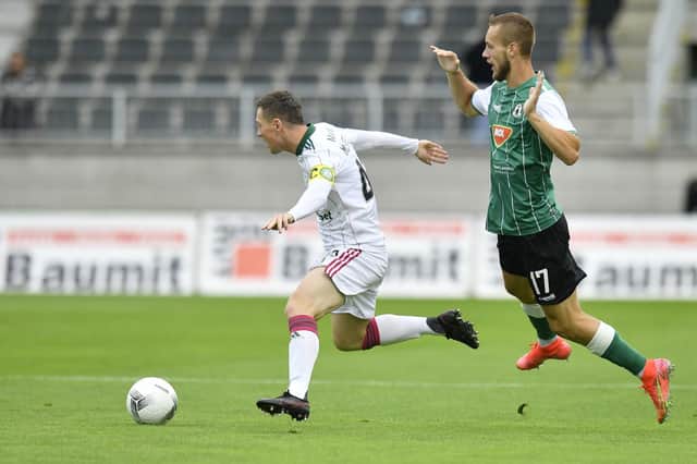 Celtic captain Callum McGregor shields the ball from FK Jablonec's Milos Kratochvil. (Radek Petrasek/CTK via AP)