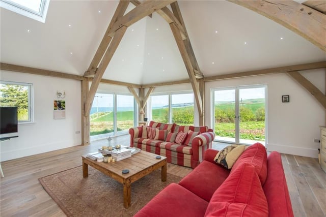 Sitting room with French doors giving access to the outside wraparound patio.