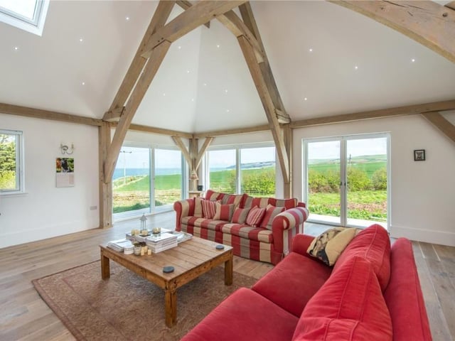 Sitting room with French doors giving access to the outside wraparound patio.
