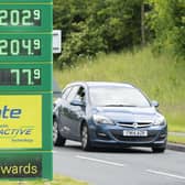 The average cost of a full tank of petrol for a typical 55-litre family car has exceeded £100 for the first time