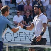 Matteo Berrettini of Italy and Andy Murray shake hands after day seven of the BOSS OPEN at Tennisclub Weissenhof on June 12, 2022 in Stuttgart, Germany. (Photo by Christian Kaspar-Bartke/Getty Images)