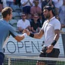 Matteo Berrettini of Italy and Andy Murray shake hands after day seven of the BOSS OPEN at Tennisclub Weissenhof on June 12, 2022 in Stuttgart, Germany. (Photo by Christian Kaspar-Bartke/Getty Images)