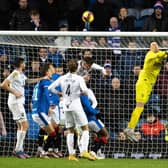 Rangers keeper Jon McLaughlin is spared by Conor Goldson heading away after missing a cross in a game wherein his uncertainty in such moments was at the heart of the loss of an equaliser to Ross County ahead of Rangers eventually running out 2-1 winners.  (Photo by Alan Harvey / SNS Group)