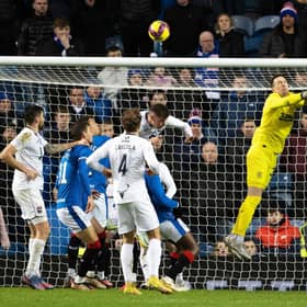 Rangers keeper Jon McLaughlin is spared by Conor Goldson heading away after missing a cross in a game wherein his uncertainty in such moments was at the heart of the loss of an equaliser to Ross County ahead of Rangers eventually running out 2-1 winners.  (Photo by Alan Harvey / SNS Group)