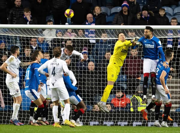Rangers keeper Jon McLaughlin is spared by Conor Goldson heading away after missing a cross in a game wherein his uncertainty in such moments was at the heart of the loss of an equaliser to Ross County ahead of Rangers eventually running out 2-1 winners.  (Photo by Alan Harvey / SNS Group)