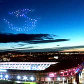 A 'drone swarm' was used to create an image of a handshake above Murrayfield Stadium in the final part of the Hogmanay film