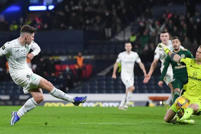 Hart makes a big save from Hibs striker Kevin Nisbet.
