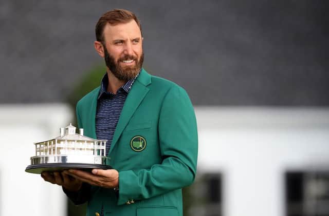 Dustin Johnson poses with the trophy after winning the Masters at Augusta National Golf Club in November, when the event was played behind closed doors. Picture: Rob Carr/Getty Images.