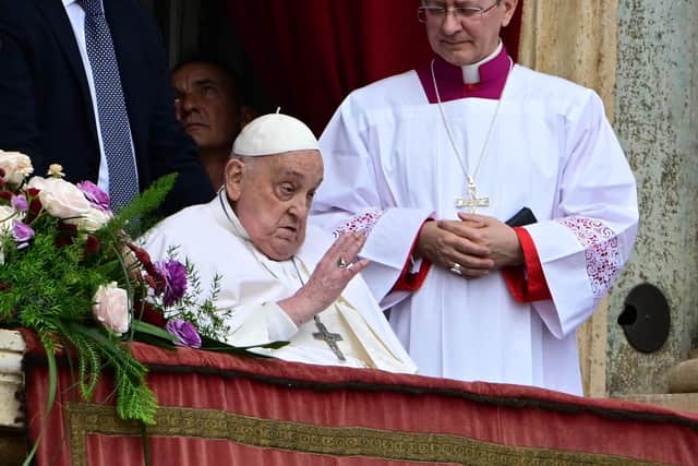 Pope Francis on the main balcony of St Peter's Basilica during the Urbi et Orbi message and blessing to the city and the world at St Peter's Square in the Vatican on Sunday, the day before he died (Picture: Tiziana Fabi/AFP via Getty Images)