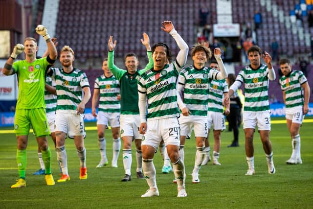 Celtic's Tomoki Iwata leads the full time celebrations after the 4-1 win over Hearts at Tynecastle.