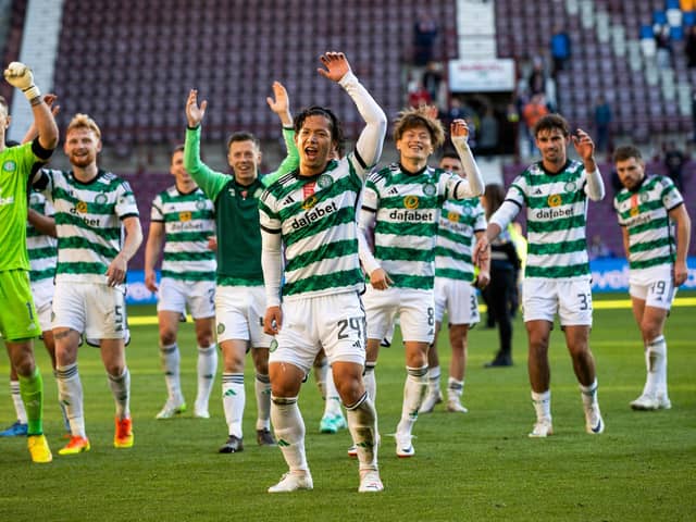 Celtic's Tomoki Iwata leads the full time celebrations after the 4-1 win over Hearts at Tynecastle.