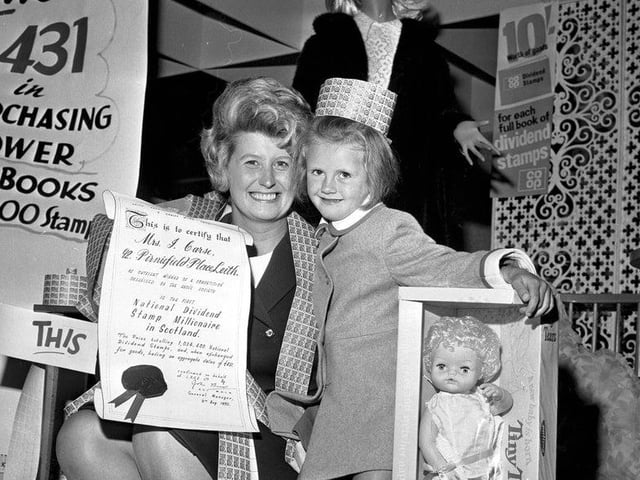 Here you can see Mrs J Carse and her daughter at Leith Provident, after Mrs Carse won one million Co-Op dividend stamps, making her a “stamp millionaire” in August 1970. Her daughter was given a Tiny Tears doll.
