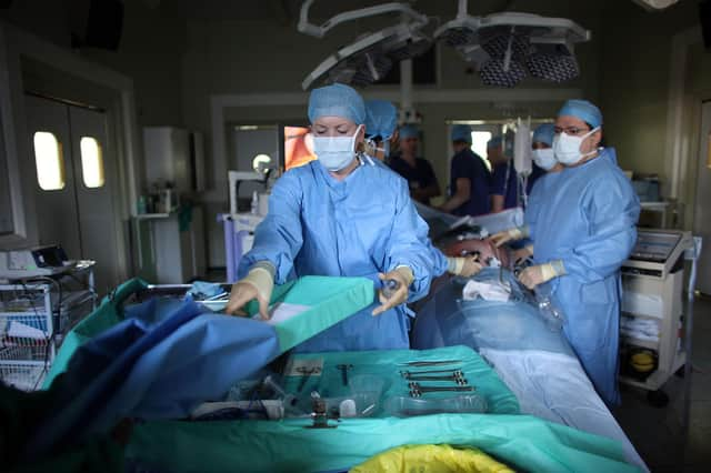 When waiting times for treatment may be long, can the NHS afford 14 different health boards in Scotland? (Picture: Christopher Furlong/Getty Images)