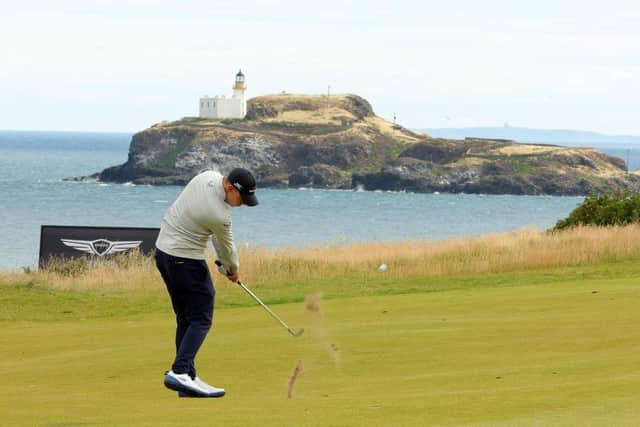 Matt Fitzpatrick plays their second shot on the 13th hole in the second round of the Genesis Scottish Open at The Renaissance Club. Picture: Kevin C. Cox/Getty Images.