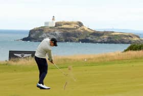 Matt Fitzpatrick  plays their second shot on the 13th hole in the second round of the Genesis Scottish Open at The Renaissance Club. Picture: Kevin C. Cox/Getty Images.