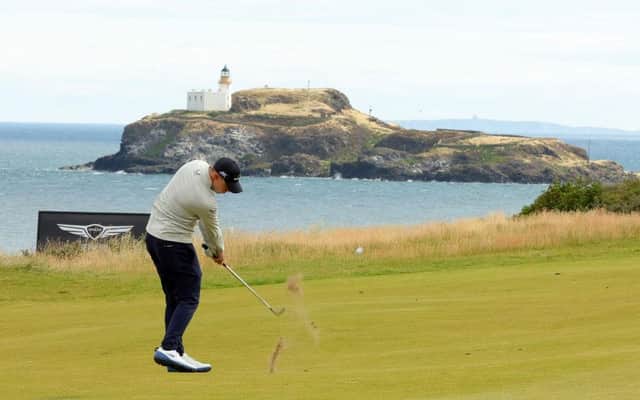 Matt Fitzpatrick plays their second shot on the 13th hole in the second round of the Genesis Scottish Open at The Renaissance Club. Picture: Kevin C. Cox/Getty Images.