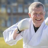 Scottish Liberal Democrat Leader Willie Rennie takes part in a karate lesson at The Meadows, Edinburgh, during campaigning for the Scottish Parliamentary election.