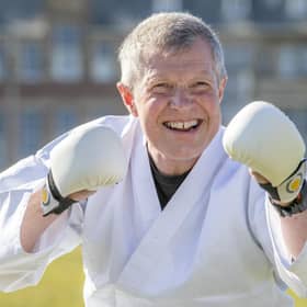 Scottish Liberal Democrat Leader Willie Rennie takes part in a karate lesson at The Meadows, Edinburgh, during campaigning for the Scottish Parliamentary election.