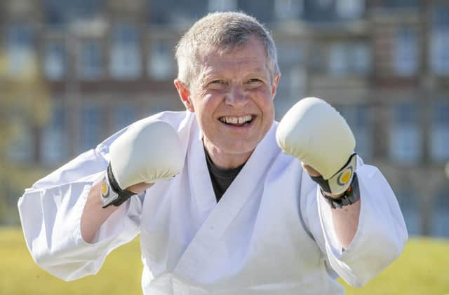 Scottish Liberal Democrat Leader Willie Rennie takes part in a karate lesson at The Meadows, Edinburgh, during campaigning for the Scottish Parliamentary election.