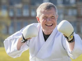 Scottish Liberal Democrat Leader Willie Rennie takes part in a karate lesson at The Meadows, Edinburgh, during campaigning for the Scottish Parliamentary election.