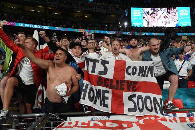England fans celebrate their team's Euro 2020 semi-final victory over Denmark on Wednesday night (Photo by Paul Ellis - Pool/Getty Images)