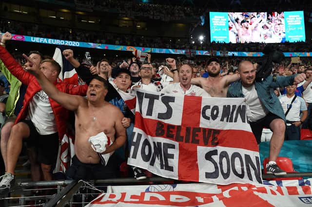 England fans celebrate their team's Euro 2020 semi-final victory over Denmark on Wednesday night (Photo by Paul Ellis - Pool/Getty Images)