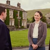 Filming has started in the Yorkshire Dales for Series 6 of All Creatures Great And Small, although as yet, cast and crew have not been spotted in their usual fliming locations. In this scene from series four, right to left, James Herriot (Nicholas Ralph) is with Mrs Hall (Anna Madeley) and Siegfried Farnon (Samuel West). Picture: Channel 5, Playground, Helen Williams