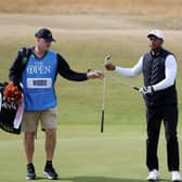 Tiger Woods with caddie Joe LaCava during a practice round prior to The 150th Open at St Andrews. Picture: Harry How/Getty Images.