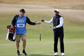 Tiger Woods with caddie Joe LaCava during a practice round prior to The 150th Open at St Andrews. Picture: Harry How/Getty Images.