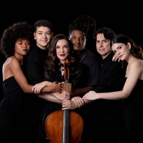 Jennifer Stumm (centre) and Ilumina players