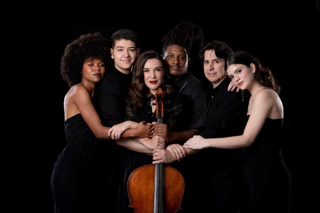 Jennifer Stumm (centre) and Ilumina players