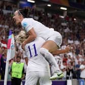 Georgia Stanway is mobbed by her England team mates as she celebrates scoring her sides second goal against Spain (Photo by Naomi Baker/Getty Images)