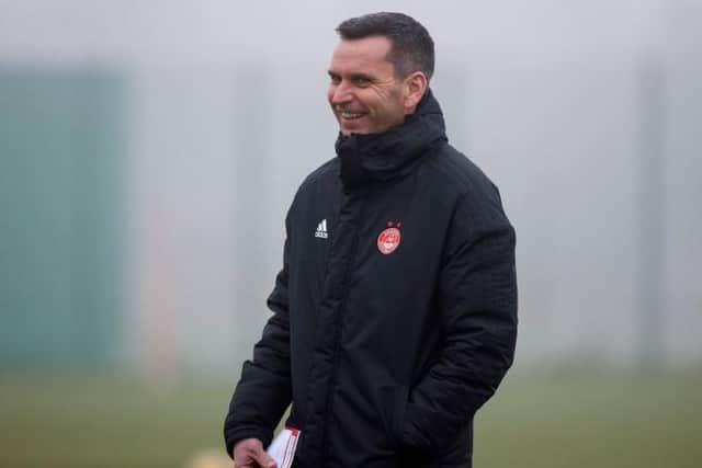 Aberdeen manager Stephen Glass in relaxed mood during training ahead of his team's return to action against Rangers at Pittodrie on Tuesday night. (Photo by Craig Williamson / SNS Group)