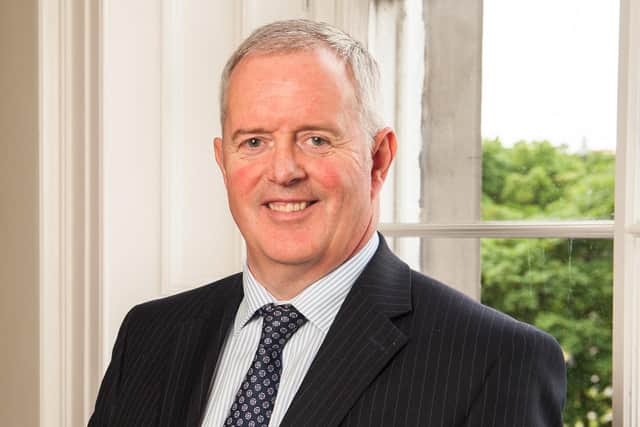 John McArthur is an expert in tax law