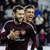 Hearts' Jorge Grant (front) celebrates with goalscorer Kenneth Vargas after providing the assist as the Costa Rican striker opened his acccount against Livingston. Photo by Mark Scates / SNS Group