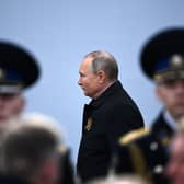 Russian President Vladimir Putin arrives to watch the Victory Day military parade at Red Square in central Moscow on May 9, 2022. - Russia celebrates the 77th anniversary of the victory over Nazi Germany during World War II. (Photo by KIRILL KUDRYAVTSEV/AFP via Getty Images)