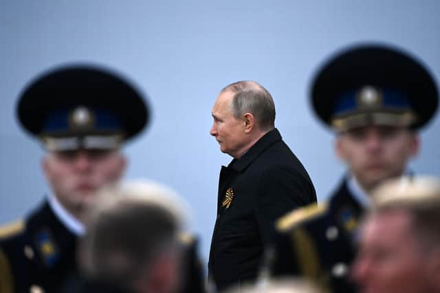 Russian President Vladimir Putin arrives to watch the Victory Day military parade at Red Square in central Moscow on May 9, 2022. - Russia celebrates the 77th anniversary of the victory over Nazi Germany during World War II. (Photo by KIRILL KUDRYAVTSEV/AFP via Getty Images)