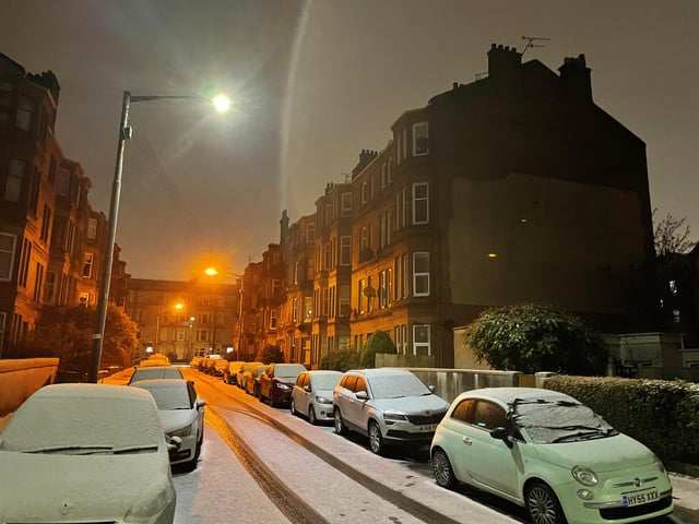 Snow covers the cars and roads in a residential area of Glasgow. Snow and ice have swept across parts of the UK, with cold wintry conditions set to continue for days. Picture date: Friday December 16, 2022.