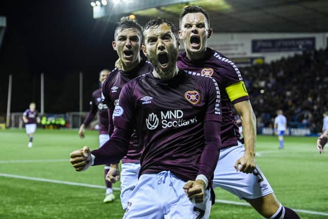 Jorge Grant is joined by Kenneth Vargas and Lawrence Shankland after opening the scoring against Kilmarnock at Rugby Park.