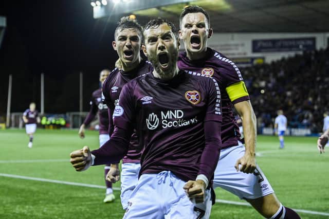 Jorge Grant is joined by Kenneth Vargas and Lawrence Shankland after opening the scoring against Kilmarnock at Rugby Park.