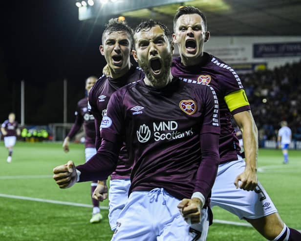 Jorge Grant is joined by Kenneth Vargas and Lawrence Shankland after opening the scoring against Kilmarnock at Rugby Park.