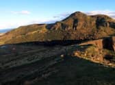 A man accused of murdering his pregnant wife by pushing her off Arthur’s Seat was eager to visit the Edinburgh landmark during his time in the Scottish capital, a court has heard.